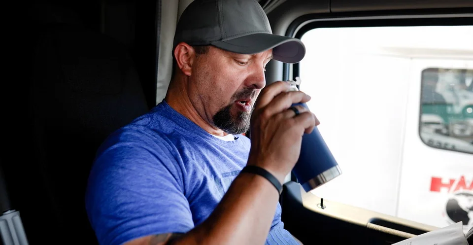 Trucker Drinks Coffee